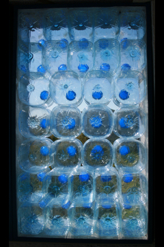 Re-Using 5litre BottlesWe re-used hundreds of 5 litre water bottles to make lightweight removable window panels