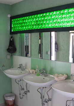 Bottle WindowsOver 150 wine bottles were saved from landfill to make this window.