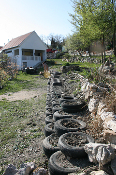 Tyred but not retiredOld tyres are routinely burnt in Montenegro. We collected 100s and used them to make retaining walls.